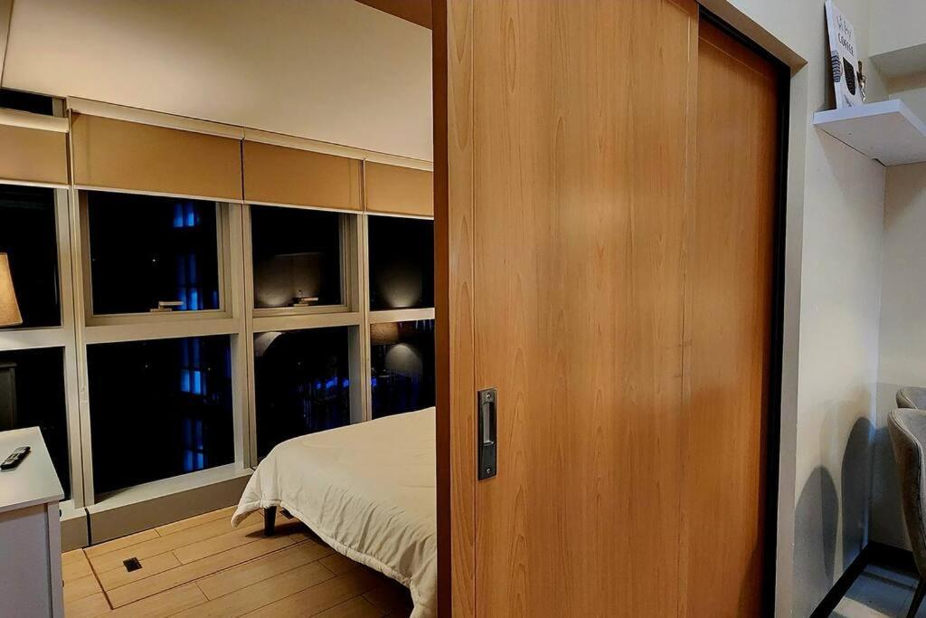 Casa Antonio At Uptown Parksuites Tower One Bgc Manille Extérieur photo
